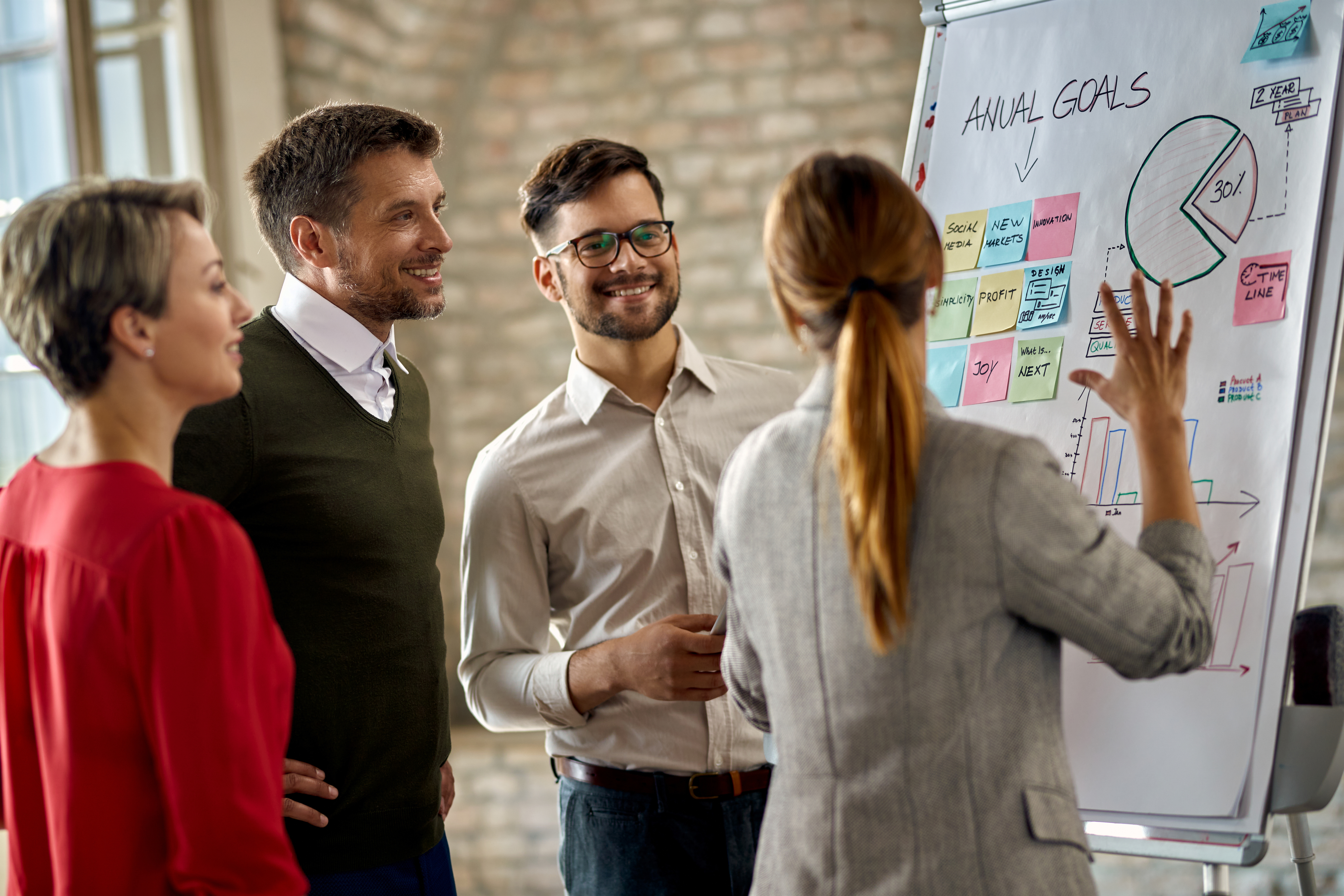 Diverse team collaborating in a modern office environment.